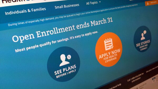 This March 1, 2014 file photo shows part of the website for HealthCare.gov, seen in Washington. President Barack Obama’s health care law has become a tale of two Americas. States that fully embraced the law’s coverage expansion are experiencing a significant drop in the share of their residents who remain uninsured, according to an extensive new poll released Tuesday. States whose leaders still object to “Obamacare” are seeing much less change. - Sputnik International