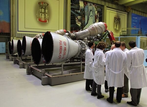 Energomash company employees stand near RD-180 engines prepared for shipment to the United States in a shop at the Energomash Energomash company employees stand near RD-180 engines prepared for shipment to the United States in a shop at the Energomash - Sputnik International