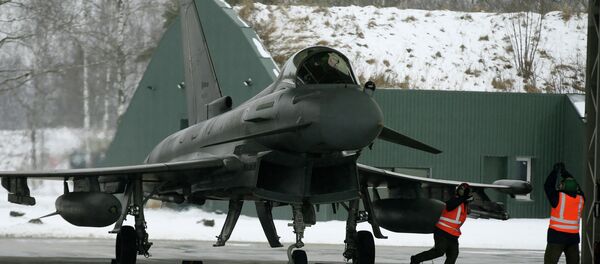 Italy's Eurofighter Typhoon jet fighter prepares for take off during NATO's Baltic Air Policing Mission at the Siauliai airbase some 240 kms (150 miles) east of the capital Vilnius, Lithuania, Thursday, Jan. 29, 2015 - Sputnik International