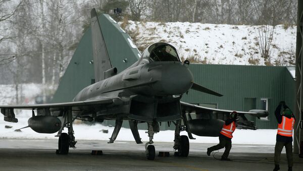 Italy's Eurofighter Typhoon jet fighter prepares for take off during NATO's Baltic Air Policing Mission at the Siauliai airbase some 240 kms (150 miles) east of the capital Vilnius, Lithuania, Thursday, Jan. 29, 2015 - Sputnik International