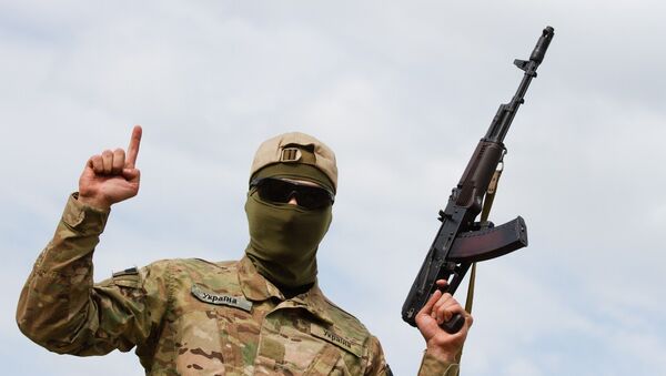 Aidar soldier pose for picture showing the islamic sign of faith - Sputnik International