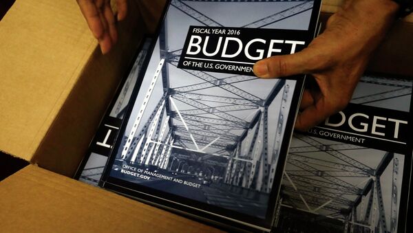 Copies of President Barack Obama's proposed 2016 budget are unboxed for sale at the Government Printing Office in Washington February 2, 2015 - Sputnik International