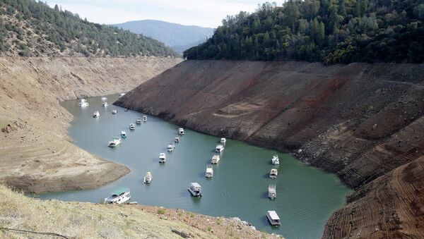 houseboats sit in the drought-lowered waters of Oroville Lake, near Oroville, California. - Sputnik International