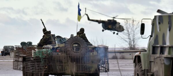 A Ukrainian helicopter flies above the headquarters of the Ukrainian forces in eastern Ukrainian city of Kramatorsk, in the Donetsk region A Ukrainian helicopter flies above the headquarters of the Ukrainian forces in eastern Ukrainian city of Kramatorsk, in the Donetsk region - Sputnik International