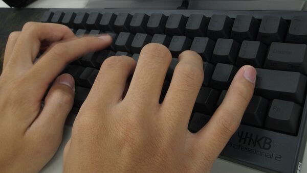 Typing on a keyboard - Sputnik International