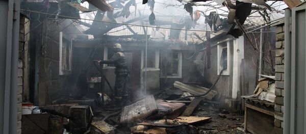 Consequences of artillery attack on Donetsk's Kuibyshevsky District Consequences of artillery attack on Donetsk's Kuibyshevsky District - Sputnik International