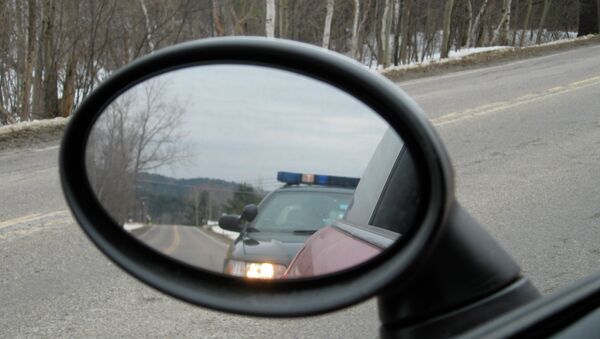 Police car in a driving mirror - Sputnik International