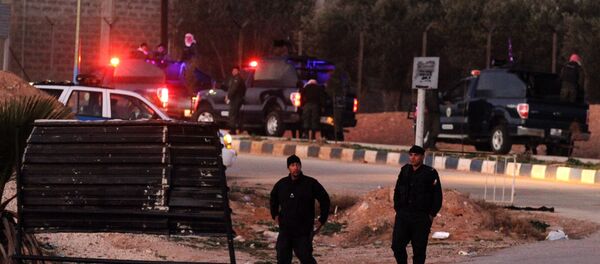 Jordanian security stand guard outside Swaqa prison, after the executions of Sajida al-Rishawi and Ziad al-Karbouly, two Iraqis linked to al-Qaida, about 50 miles (80 kilometers) south of the Jordan's capital, Amman, Wednesday, Feb. 4, 2015. - Sputnik International