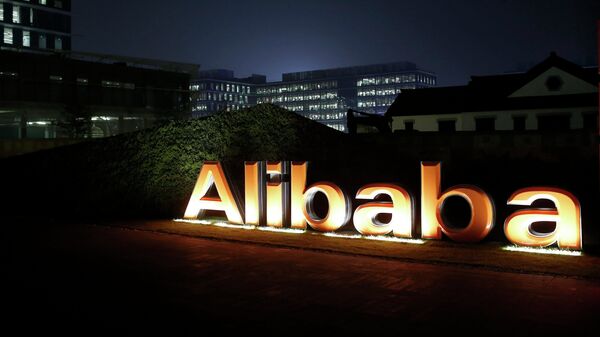 The logo of Alibaba Group is seen inside the company's headquarters in Hangzhou, Zhejiang province early in this November 11, 2014 file photo - Sputnik International