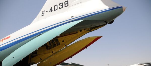 Chinese evacuees board a Chinese air force transporter at Sudan's Khartoum international airport, March 3, 2011. Chinese evacuees board a Chinese air force transporter at Sudan's Khartoum international airport, March 3, 2011. - Sputnik International