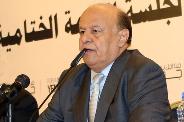 Yemeni President Abed Rabbo Mansour Hadi speaks during the closing session of the national dialogue conference in Sanaa, Yemen. Hadi submited his resignation Thursday, Jan. 22, 2015, over a standoff with Shiite rebels who control the capital.  - Sputnik International