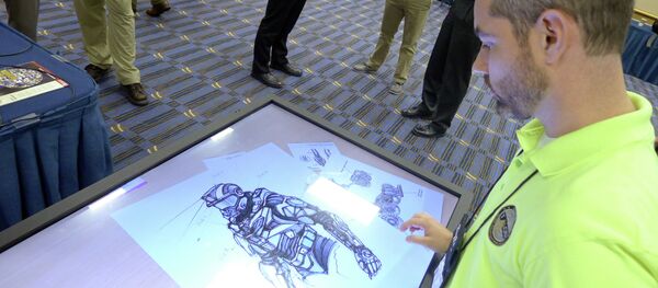 Sketches of the body armor exoskeleton during the Special Operations Forces Industry Conference in Tampa - Sputnik International
