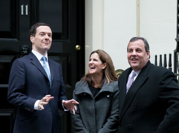 New Jersey Gov. Chris Christie, right, with his wife Mary Pat are greeted by Britain's Chancellor of the Exchequer George Osborne New Jersey Gov. Chris Christie, right, with his wife Mary Pat are greeted by Britain's Chancellor of the Exchequer George Osborne - Sputnik International
