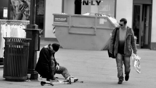 A beggar in the centre of Oslo, Norway - Sputnik International