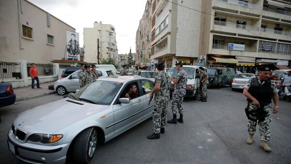 Lebanese security forces man a checkpoint in the southern suburb of the capital Beirut - Sputnik International