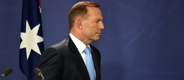 Australia's Prime Minister Tony Abbott leaves following a press conference in Sydney on February 6, 2015. Australia's Prime Minister Tony Abbott leaves following a press conference in Sydney on February 6, 2015. - Sputnik International