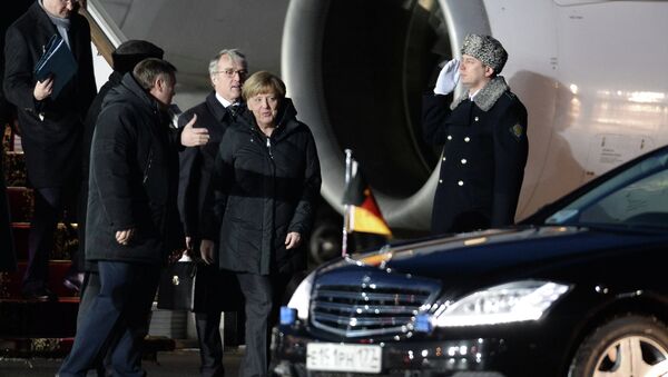German Chancellor Merkel, French President Hollande arrive in Moscow - Sputnik International