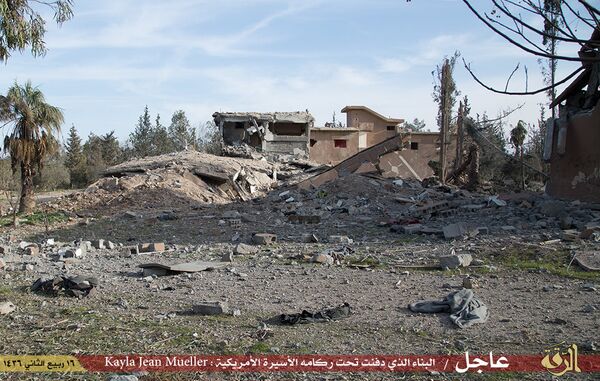 ISIL claims this is the building Kayla Jean Mueller was being held in which was hit by a Jordanian airstrike. ISIL claims this is the building Kayla Jean Mueller was being held in which was hit by a Jordanian airstrike. - Sputnik International