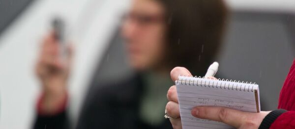 A new poll finds that nearly two-thirds of investigative reporters believe that the government has spied on their phone calls and online communications. A new poll finds that nearly two-thirds of investigative reporters believe that the government has spied on their phone calls and online communications. - Sputnik International