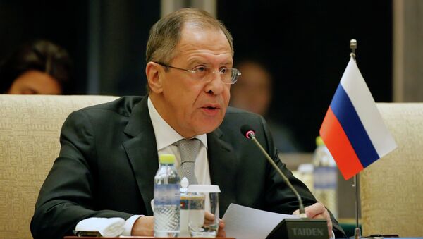Russian Foreign Minister Sergei Lavrov speaks during the thirteenth meeting of the Foreign Ministers of China, Russia and India, in Beijing on February 2, 2015 - Sputnik International