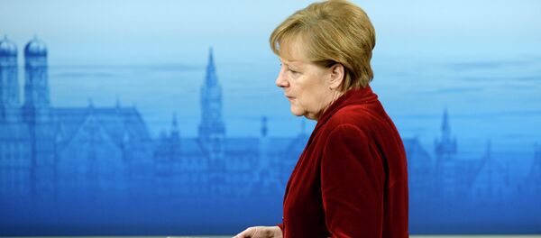 German Chancellor Angela Merkel enters the podium to deliver a speech during the 51st Munich Security Conference (MSC) in Munich German Chancellor Angela Merkel enters the podium to deliver a speech during the 51st Munich Security Conference (MSC) in Munich - Sputnik International
