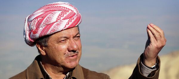 Iraqi Kurdish leader Masoud Barzani speaks to journalists on December 21, 2014 during a visit to Mount Sinjar, west of the northern Iraqi city of Mosul. - Sputnik International