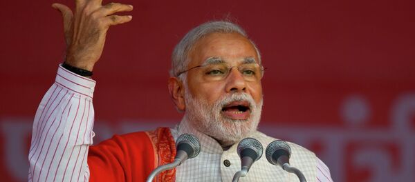 Indian Prime Minister Narendra Modi addresses an election campaign rally for his Bharatiya Janata Party (BJP) ahead of Delhi state election in New Delhi, India, Wednesday, Feb. 4, 2015 Indian Prime Minister Narendra Modi addresses an election campaign rally for his Bharatiya Janata Party (BJP) ahead of Delhi state election in New Delhi, India, Wednesday, Feb. 4, 2015 - Sputnik International