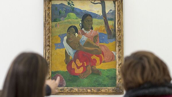Women look at the painting Nafea faa ipoipo? (1892) by French painter Paul Gauguin in the Fondation Beyeler in Riehen, Switzerland - Sputnik International