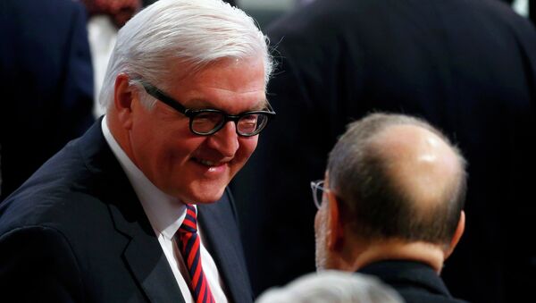 German Foreign Minister Frank-Walter Steinmeier (L) arrives for the chairman's debate during the 51st Munich Security Conference at the 'Bayerischer Hof' hotel in Munich February 8, 2015 - Sputnik International