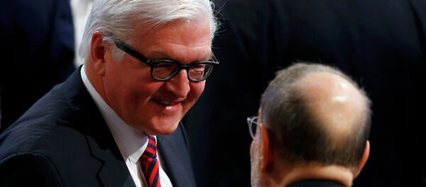 German Foreign Minister Frank-Walter Steinmeier (L) arrives for the chairman's debate during the 51st Munich Security Conference at the 'Bayerischer Hof' hotel in Munich February 8, 2015 German Foreign Minister Frank-Walter Steinmeier (L) arrives for the chairman's debate during the 51st Munich Security Conference at the 'Bayerischer Hof' hotel in Munich February 8, 2015 - Sputnik International