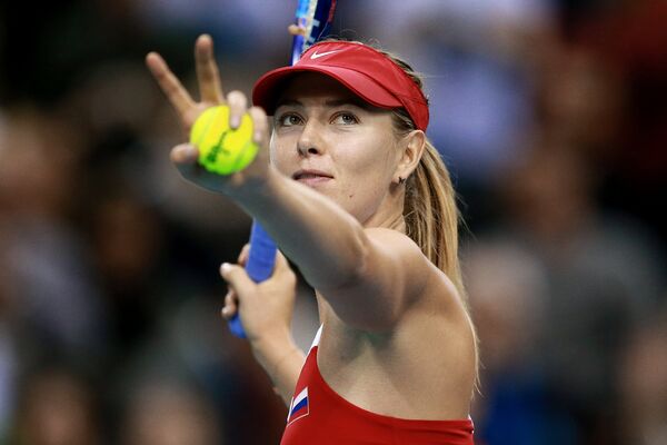 Russia's Maria Sharapova during her win over Poland's Agnieszka Radwanska during their Fed Cup World Group 1st round tennis match between Poland and Russia in Krakow, Poland on February 8, 2015 - Sputnik International