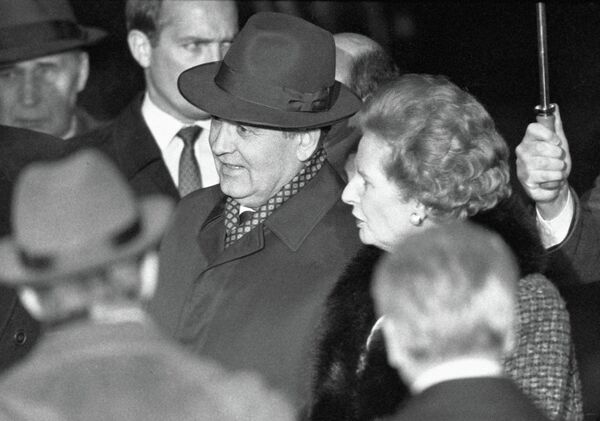 The Soviet leader Mikhail Gorbachev (center) meeting with UK Prime Minister Margaret Thatcher during his official visit to the United Kingdom in 1989. The Soviet leader Mikhail Gorbachev (center) meeting with UK Prime Minister Margaret Thatcher during his official visit to the United Kingdom in 1989. - Sputnik International