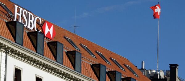 A HSBC logo at a Swiss branch of the bank, in Geneva. A HSBC logo at a Swiss branch of the bank, in Geneva. - Sputnik International