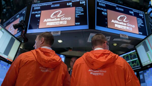 Specialist traders work at the post that trades Alibaba Group Holding Ltd during the company's initial public offering (IPO) under the ticker BABA at the New York Stock Exchange in New York in this September 19, 2014 file photo - Sputnik International