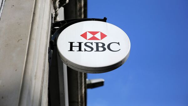 An HSBC sign is seen outside a bank branch in London February 9, 2015 - Sputnik International