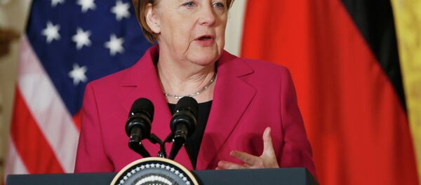 German Chancellor Angela Merkel speaks as she holds a joint news conference with U.S. President Barack Obama in the East Room of the White House in Washington February 9, 2015 - Sputnik International