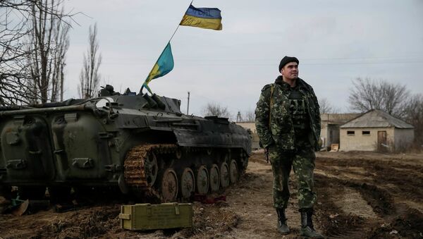 A Ukrainian serviceman is pictured at his position near Debaltseve, eastern Ukraine, February 8, 2015 - Sputnik International