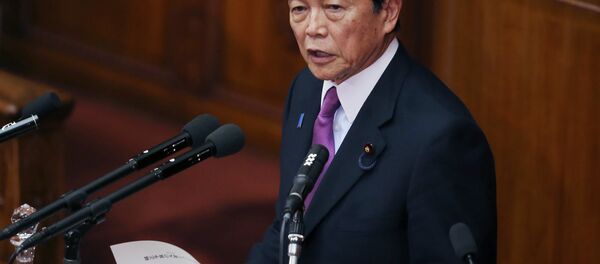 Japan's Finance Minister Taro Aso speaks during a opening session at the lower house of Parliament in Tokyo, Monday, Jan. 26, 2015 - Sputnik International