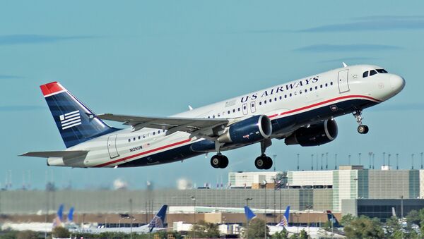 A US Airways aircraft made an emergency landing without the nose gear at George Bush Intercontinental Airport in Houston, Texas - Sputnik International