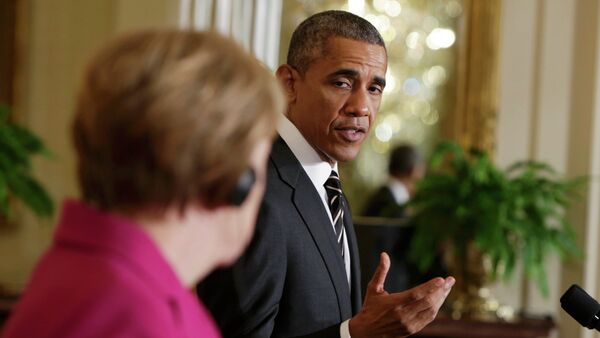 U.S. President Barack Obama speaks during a joint news conference with German Chancellor Angela Merkel in the East Room of the White House in Washington February 9, 2015 - Sputnik International