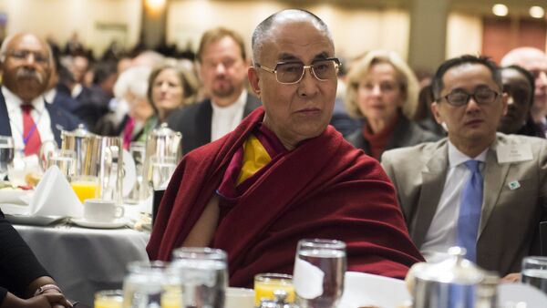 The Dalai Lama attends the National Prayer Breakfast in Washington, DC, February 5, 2015 - Sputnik International