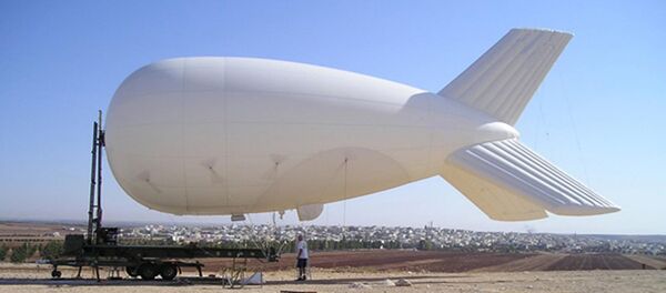 Large recon balloons originally meant to spot Taliban fighters are now searching for immigrants along the Rio Grande. Large recon balloons originally meant to spot Taliban fighters are now searching for immigrants along the Rio Grande. - Sputnik International