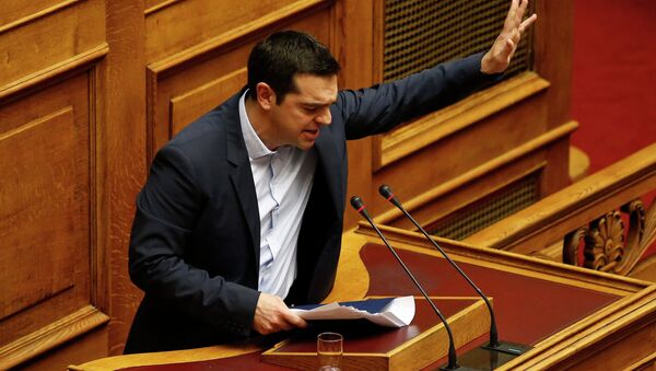 Greek Prime Minister Alexis Tsipras waves to lawmakers following his first major speech in parliament in Athens February 8, 2015 - Sputnik International