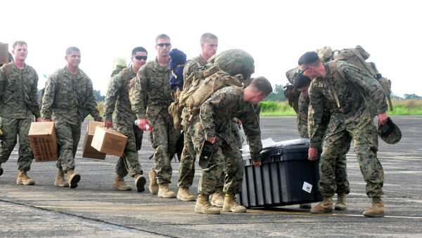 US marines arrival at the Roberts International airport in Monrovia, Liberia, Thursday, Oct. 9, 2014 - Sputnik International