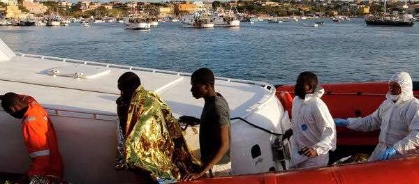 Migrants who survived a shipwreck Migrants who survived a shipwreck - Sputnik International