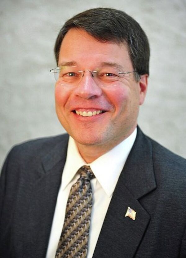 Representative David Moore - Sputnik International