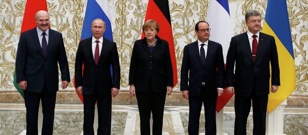 Belarus' President Alexander Lukashenko (L), Russia's President Vladimir Putin (2nd L), Ukraine's President Petro Poroshenko (R), Germany's Chancellor Angela Merkel (C) and France's President Francois Hollande pose for a family photo during peace talks in Minsk, February 11, 2015. Belarus' President Alexander Lukashenko (L), Russia's President Vladimir Putin (2nd L), Ukraine's President Petro Poroshenko (R), Germany's Chancellor Angela Merkel (C) and France's President Francois Hollande pose for a family photo during peace talks in Minsk, February 11, 2015. - Sputnik International