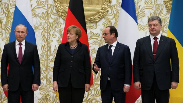 From the left : Russian President Vladimir Putin, German Chancellor Angela Merkel, French President Francois Hollande, and Ukrainian President Petro Poroshenko at their peace talks in Minsk - Sputnik International