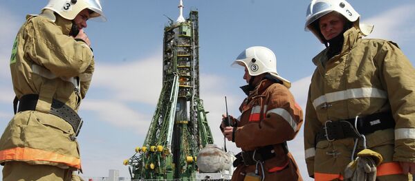 Russian Emergency Situations Ministry staff provide security on the launch pad before launch of the Soyuz TMA-21 Gagarin at the Baikonur Cosmodrome Russian Emergency Situations Ministry staff provide security on the launch pad before launch of the Soyuz TMA-21 Gagarin at the Baikonur Cosmodrome - Sputnik International