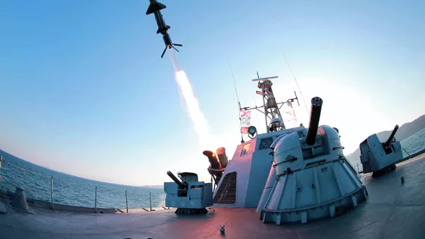 A missile is fired from a naval vessel during the test-firing of a new type of anti-ship cruise missile to be equipped at Korean People's Army (KPA) naval units. - Sputnik International